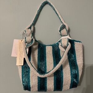 Viral teal and white striped beaded bag